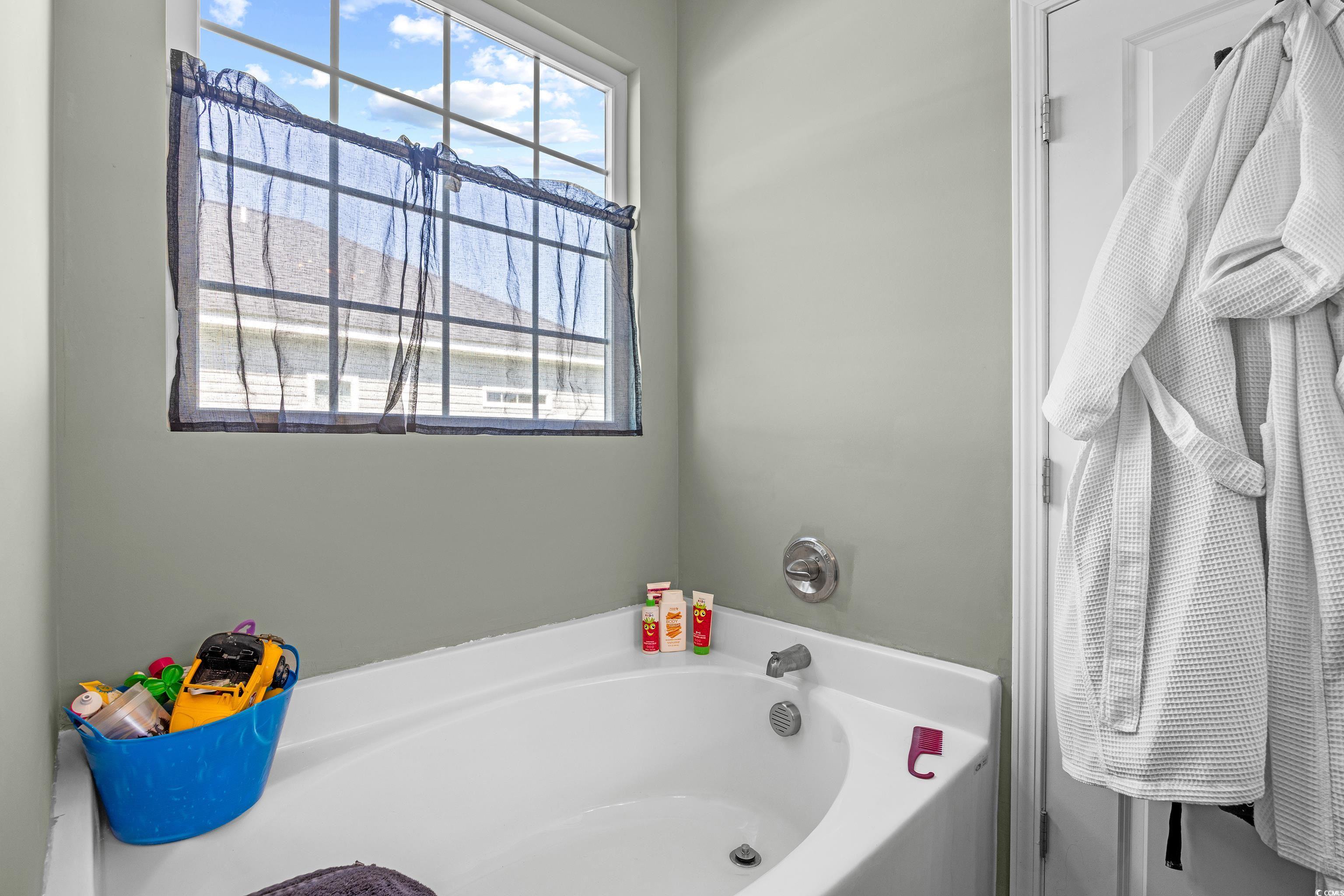 704 Hobonny Loop Longs, SC 29568 - Photo 22 of 36 Full bath featuring healthy amount of natural ligh