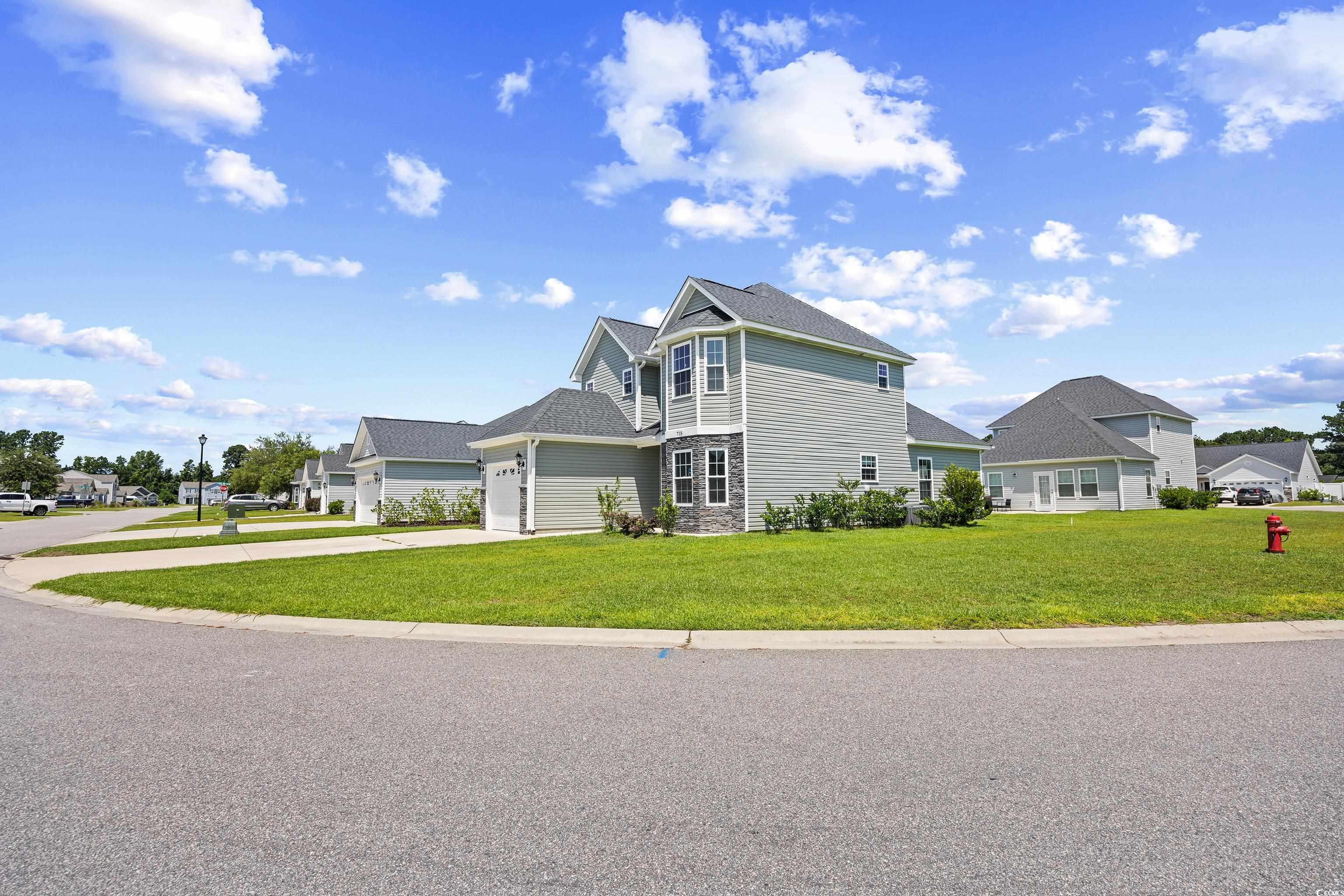704 Hobonny Loop Longs, SC 29568 - Photo 30 of 36 View of front of home featuring concrete driveway,