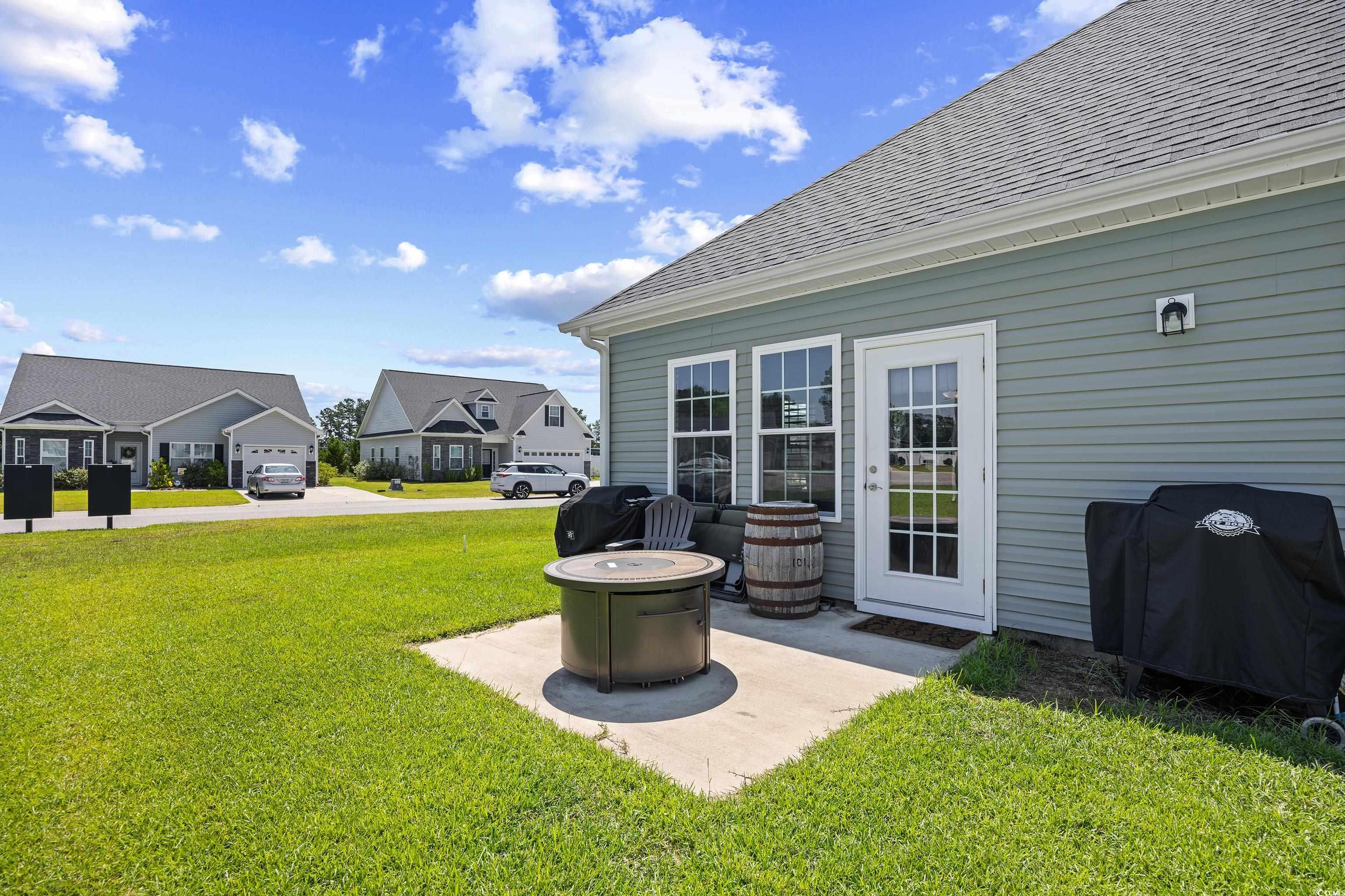 704 Hobonny Loop Longs, SC 29568 - Photo 32 of 36 View of grassy yard with a residential view