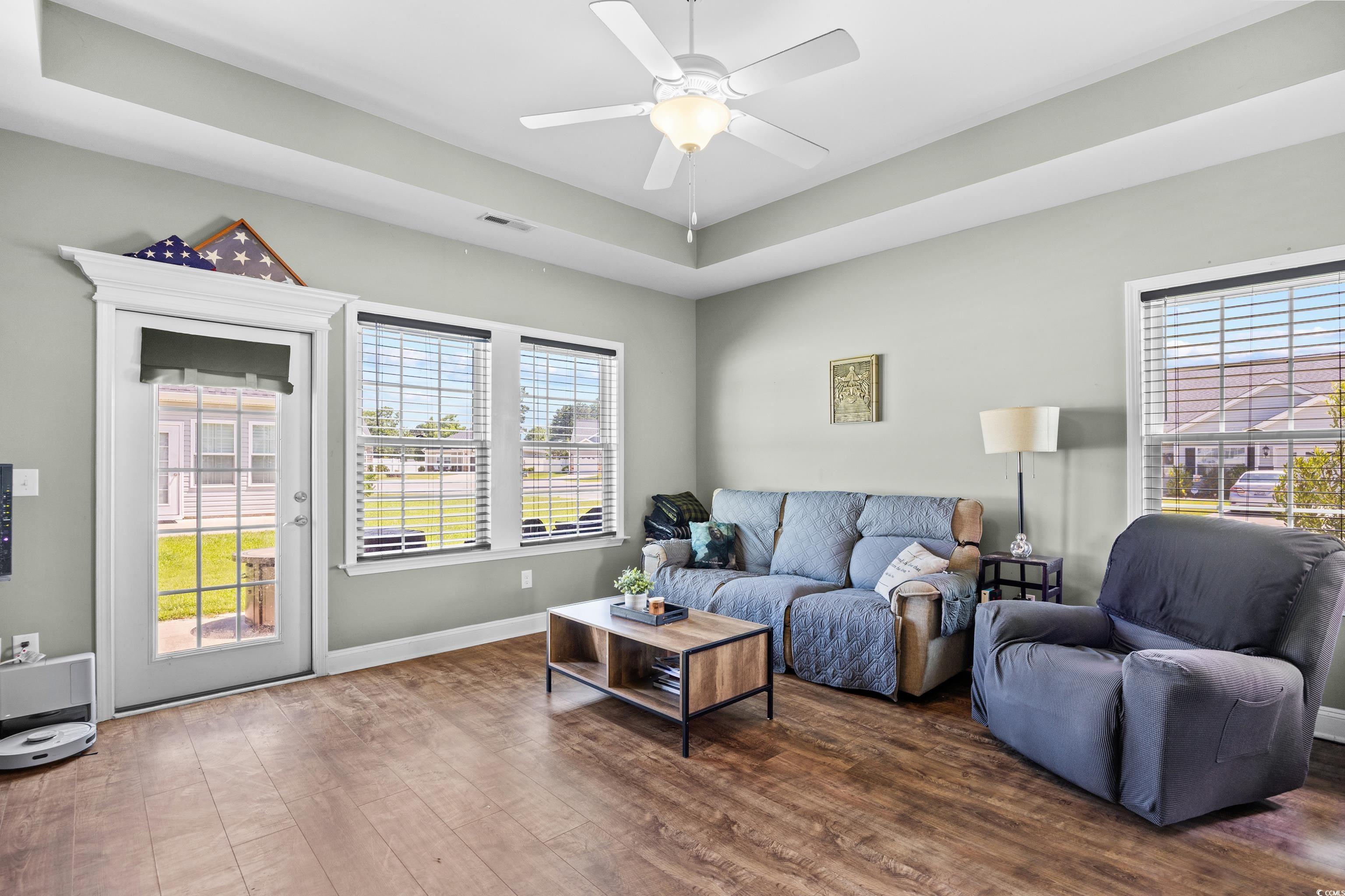 704 Hobonny Loop Longs, SC 29568 - Photo 8 of 36 Living area with wood finished floors and ceiling