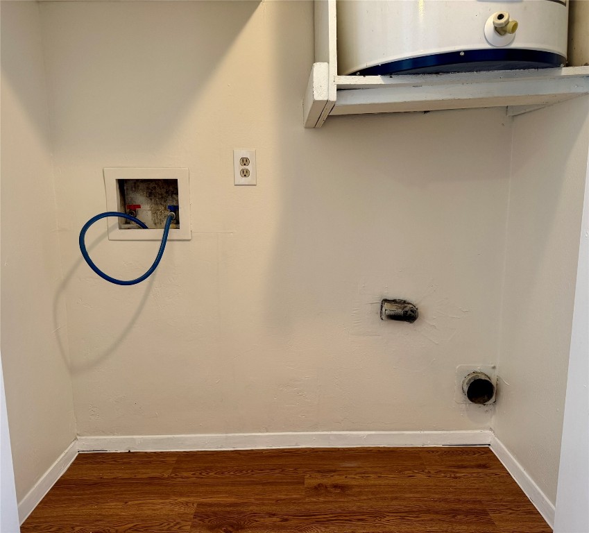 8905 Parkfield Drive, Unit 201 Austin, TX 78758 - Photo 11 of 13 a view of a livingroom with wooden floor and a window