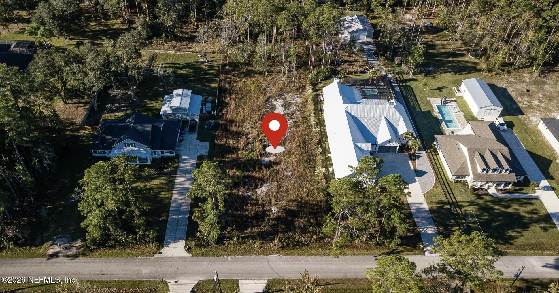 0 Lee Road Fruit Cove, FL 32259 - Photo 2 of 2 an aerial view of a houses with yard