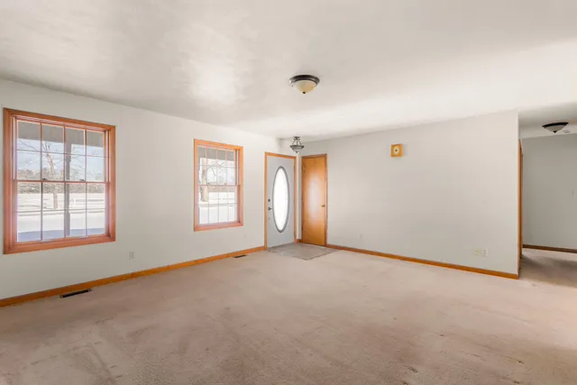 an empty room with windows