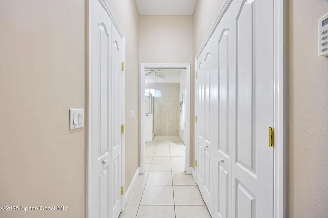a spacious bathroom with a shower sink and mirror