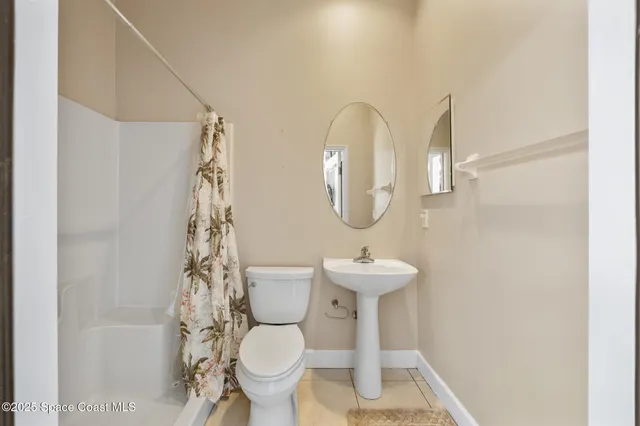 a view of an house with backyard space and garden