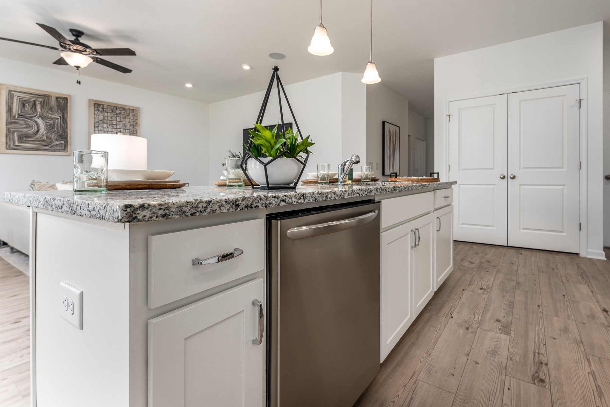 1116 Southerlynn Drive White House, TN 37188 - Photo 11 of 18 a kitchen with stainless steel appliances granite countertop a sink a stove and a wooden floors