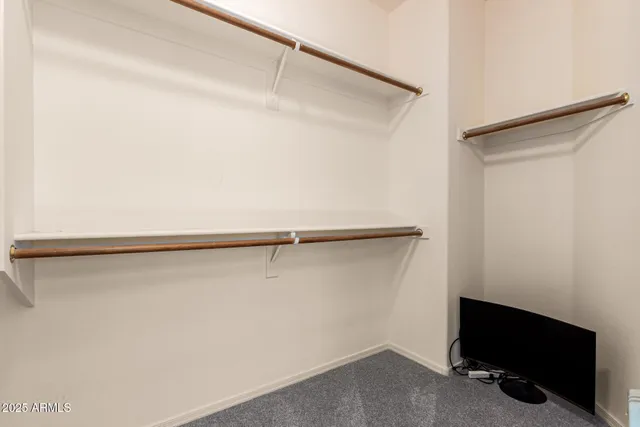 a view of a room with racks on the wall