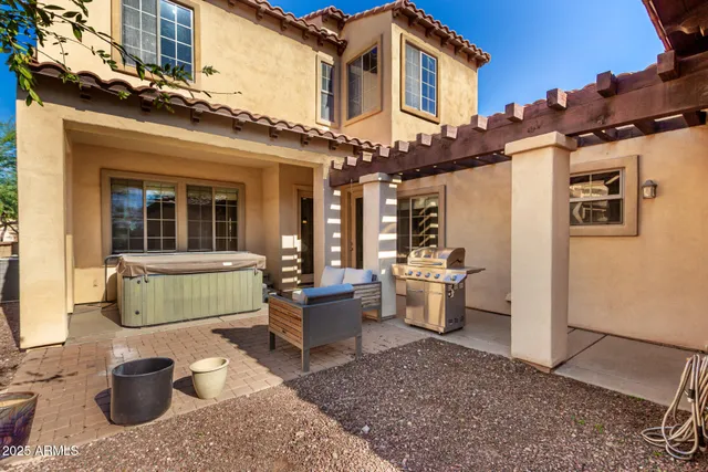 a view of a patio with couches table and chairs