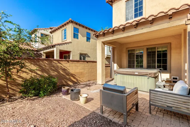 a view of a building with a sitting area