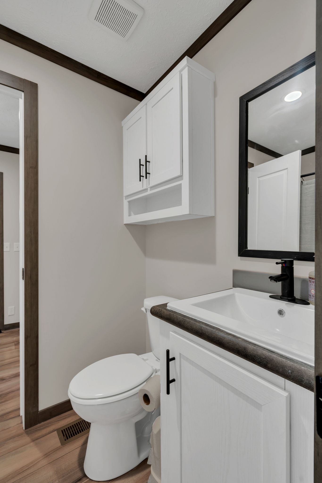 351 Wismer Road Camden, TN 38320 - Photo 13 of 27 a bathroom with a sink toilet and mirror