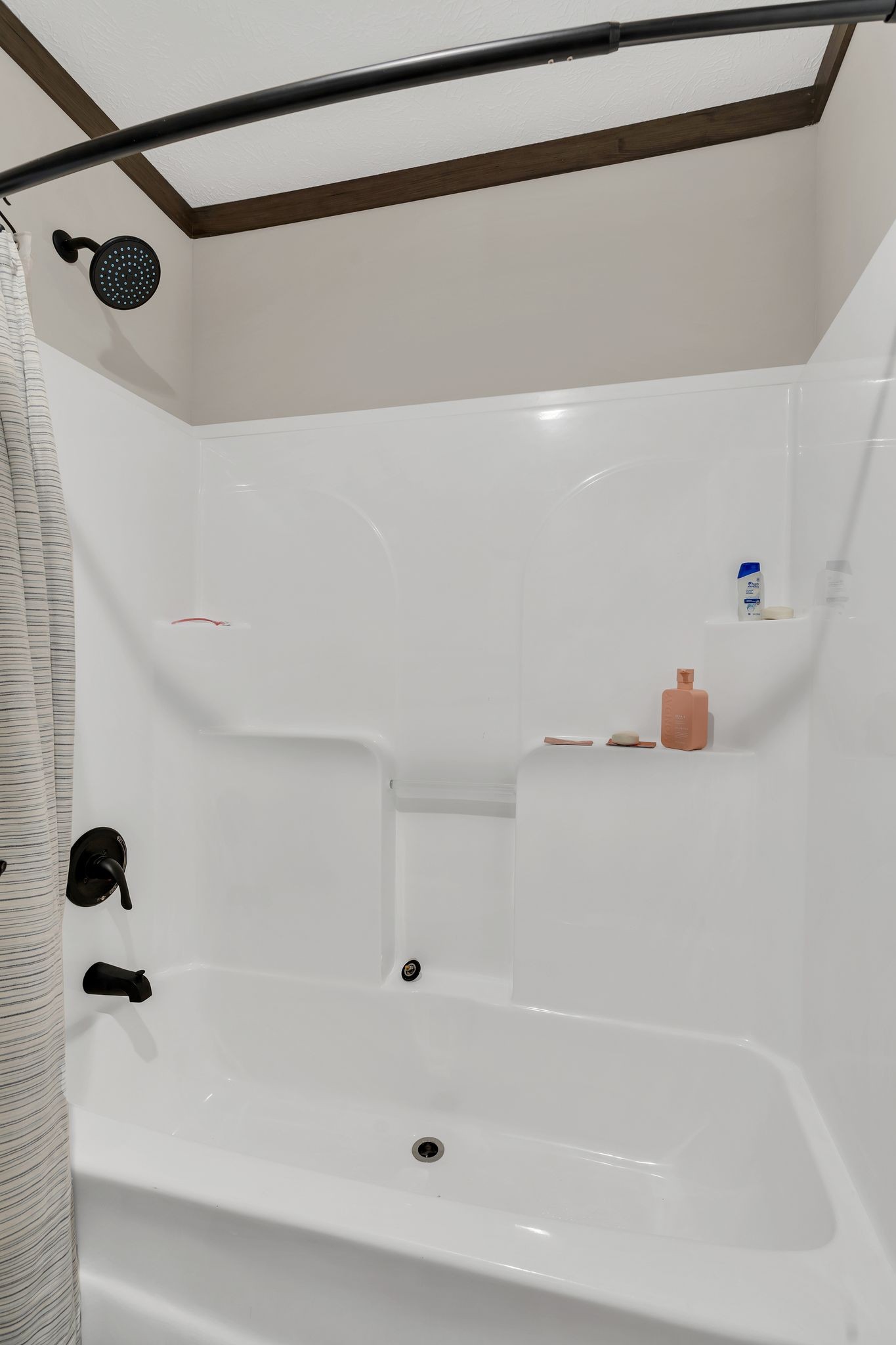 351 Wismer Road Camden, TN 38320 - Photo 14 of 27 a bathroom with a shower and a bath tub