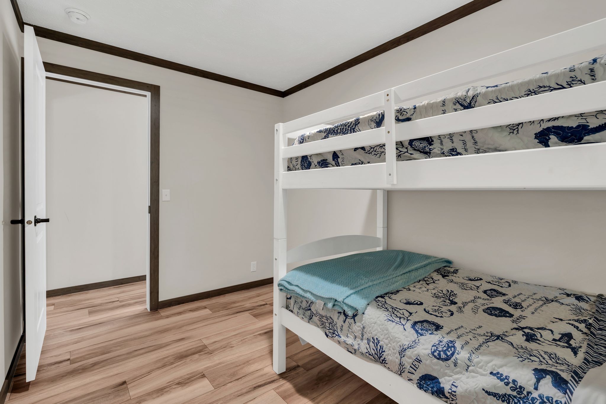 351 Wismer Road Camden, TN 38320 - Photo 16 of 27 a kitchen with a stove and wooden floor