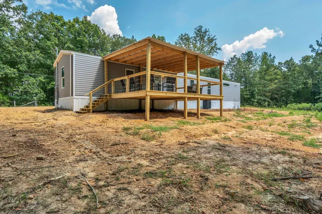 a house view with a outdoor space