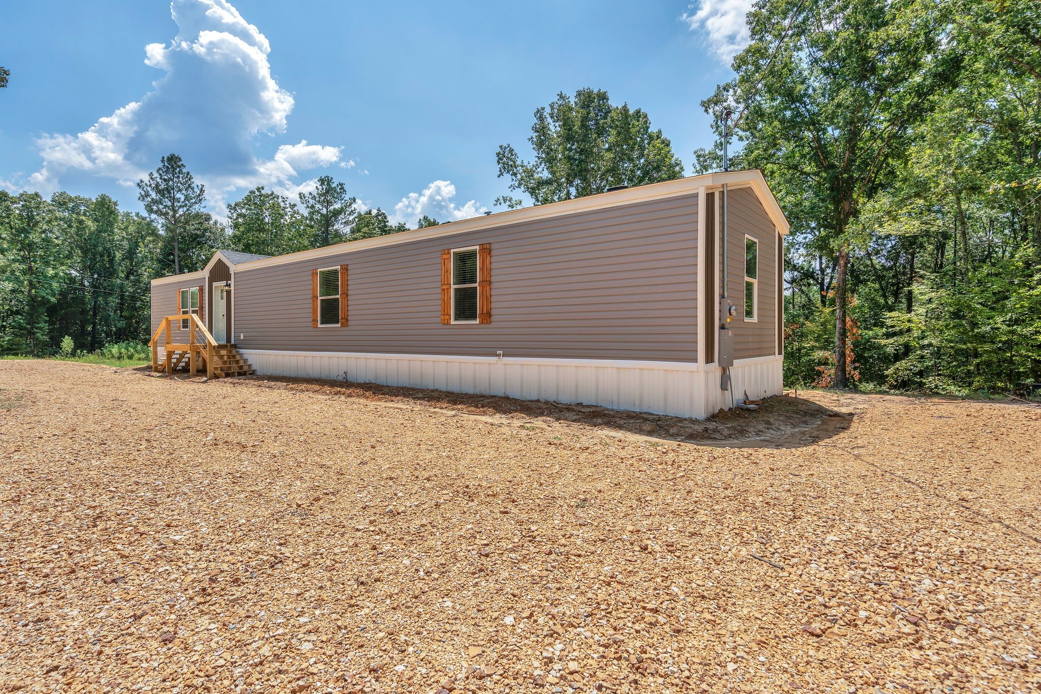 351 Wismer Road Camden, TN 38320 - Photo 7 of 27 a backyard of a house with lots of green space