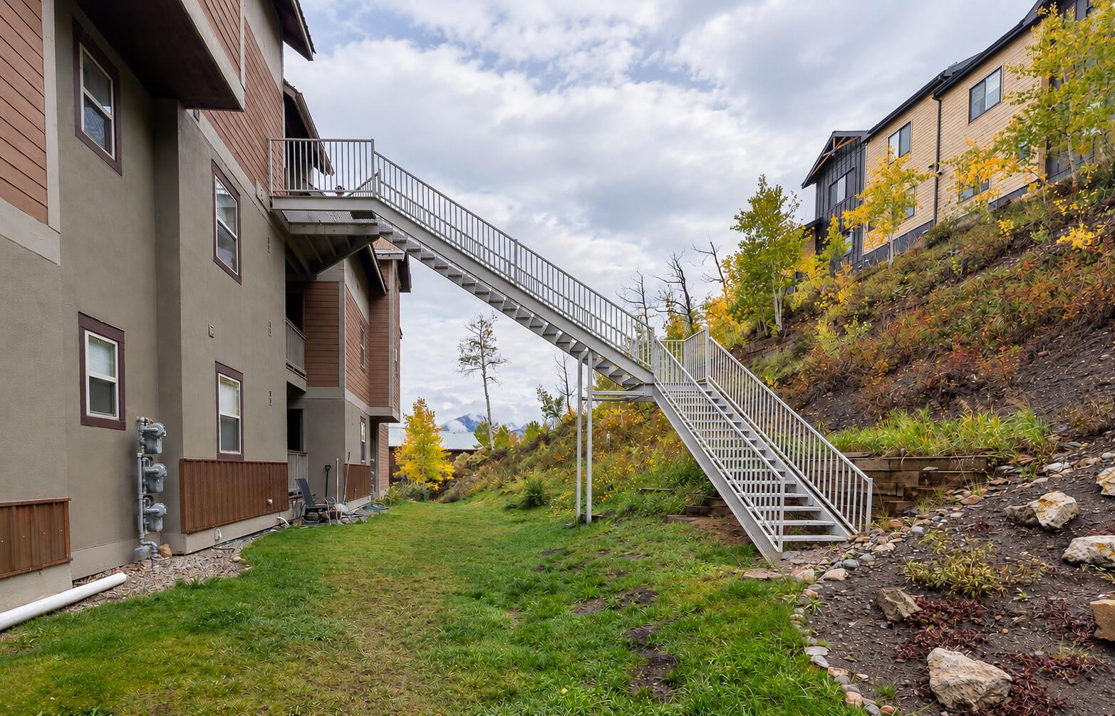 327 Adams Ranch Road, Unit 203 Mountain Village, CO 81435 - Photo 21 of 21 Back stairs to yard