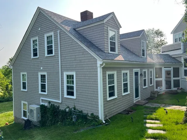 a backyard of a house with lots of green space