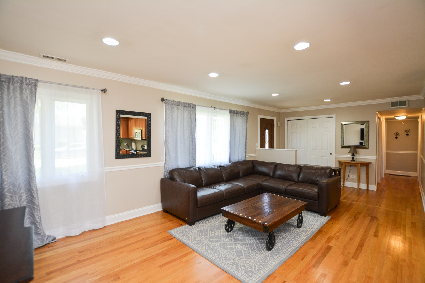 36 Johnathan Road Lake Zurich, IL 60047 - Photo 13 of 25 a living room with furniture and a wooden floor