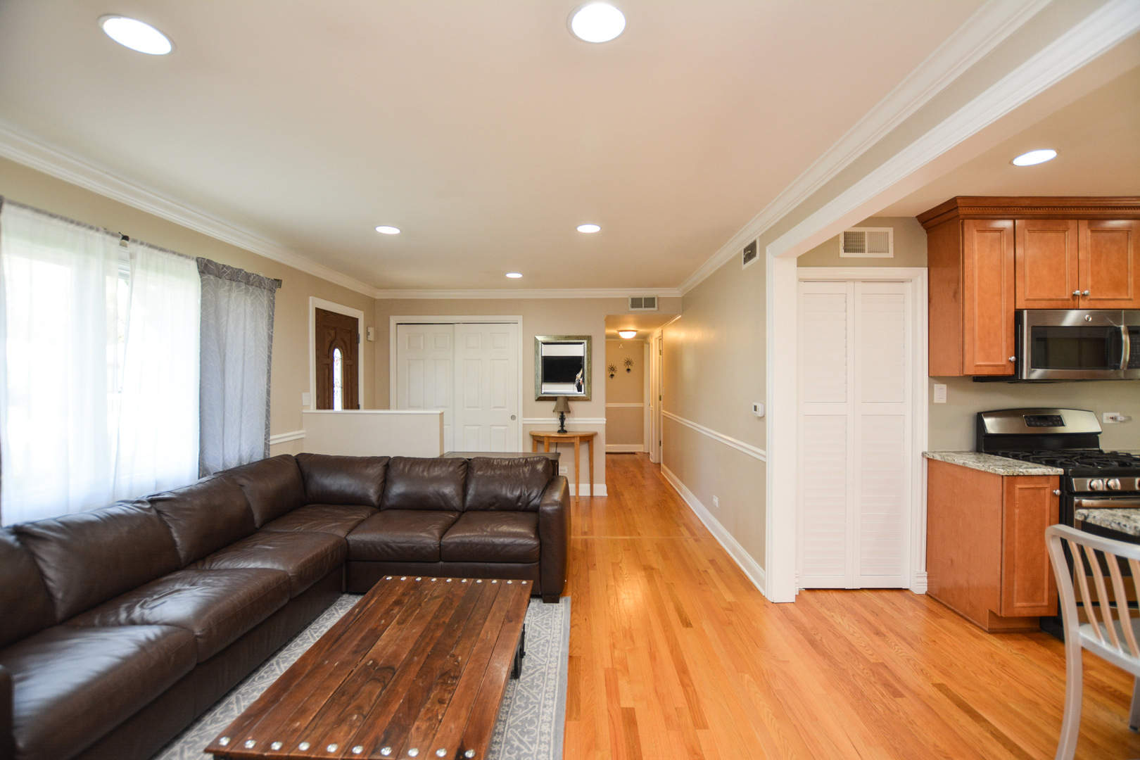 36 Johnathan Road Lake Zurich, IL 60047 - Photo 14 of 25 a living room with stainless steel appliances furniture and a wooden floor