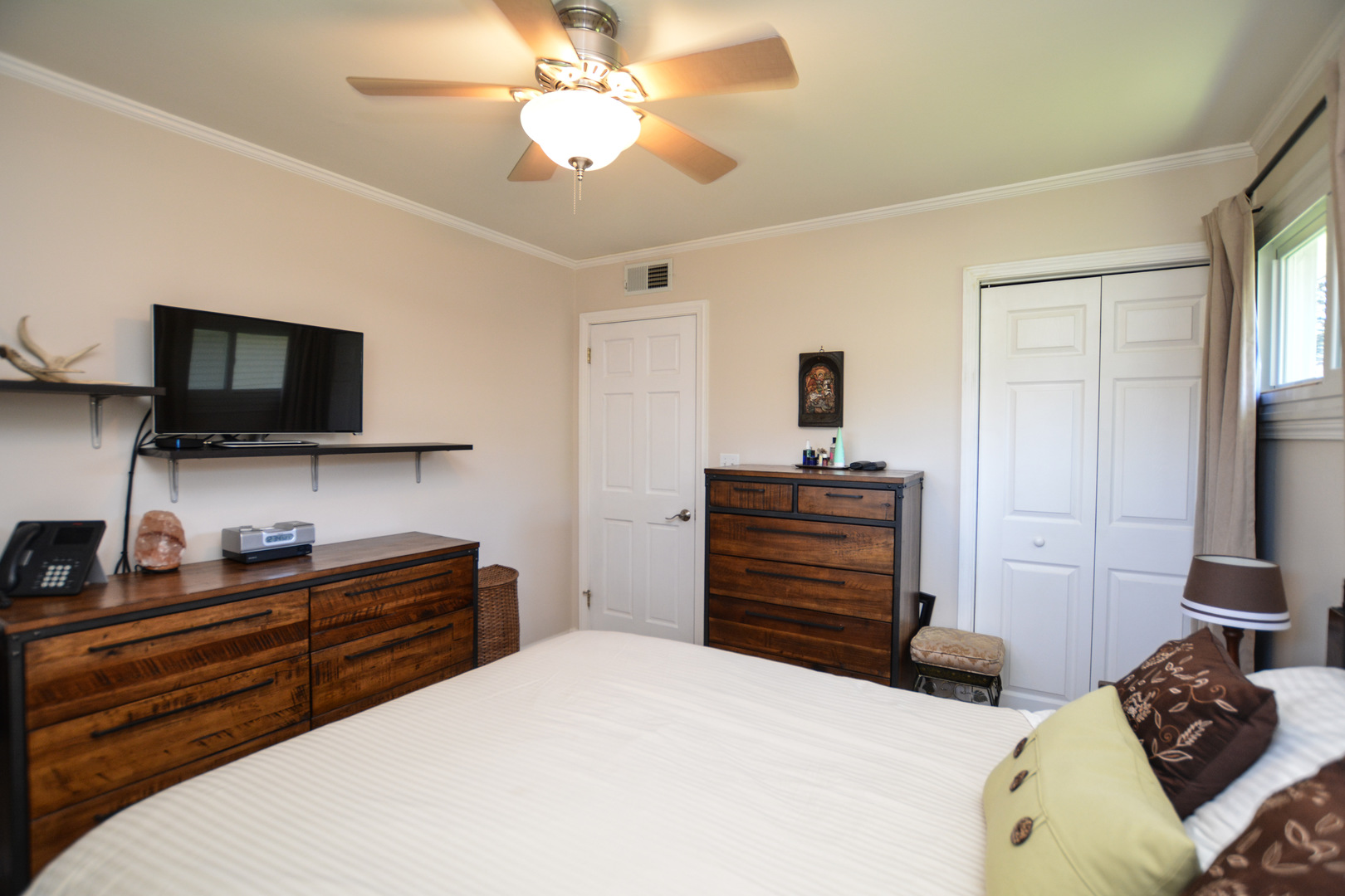 36 Johnathan Road Lake Zurich, IL 60047 - Photo 19 of 25 a bedroom with a bed and flat screen tv