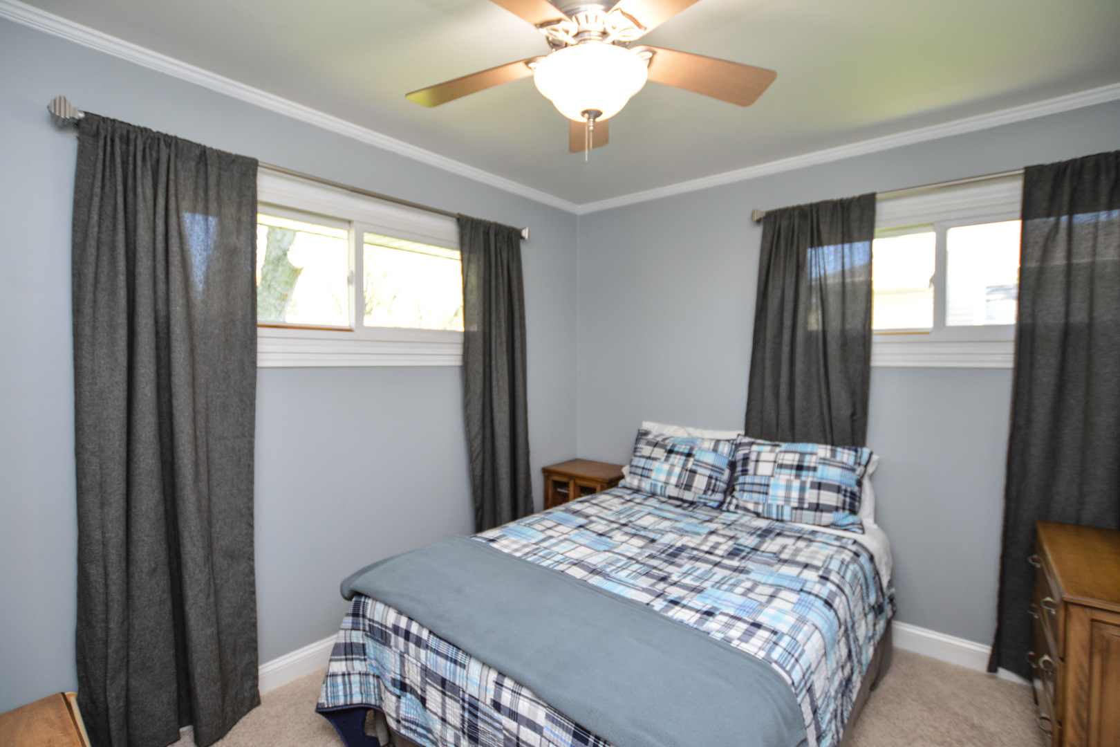 36 Johnathan Road Lake Zurich, IL 60047 - Photo 22 of 25 a bedroom with a bed and a chandelier