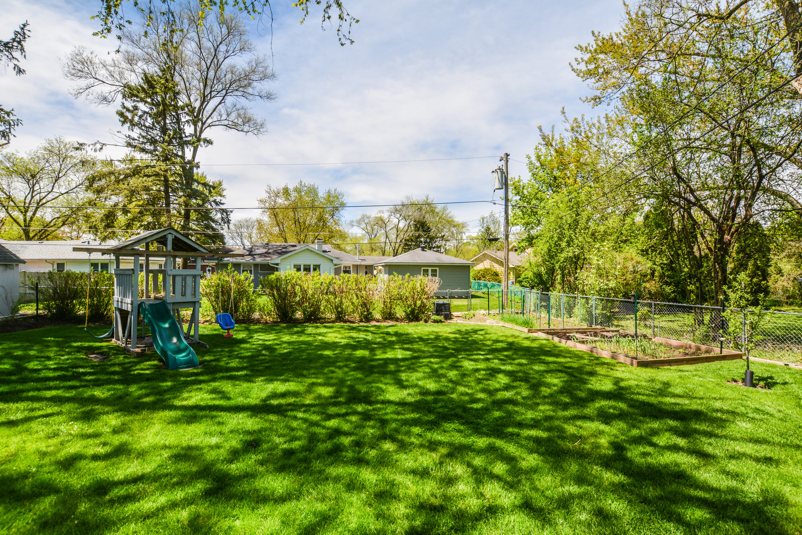 36 Johnathan Road Lake Zurich, IL 60047 - Photo 7 of 25 a view of a big yard with plants and large trees