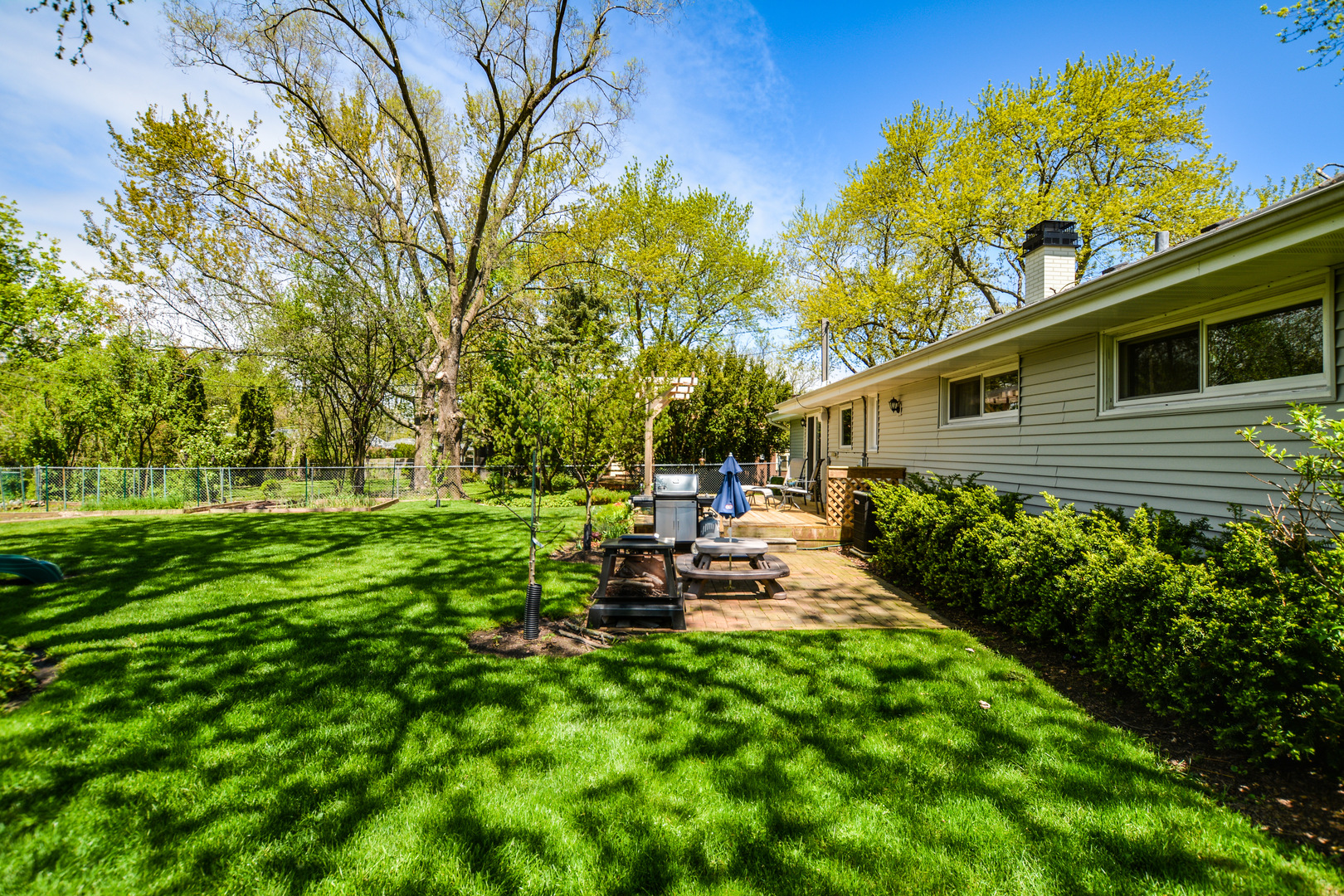 36 Johnathan Road Lake Zurich, IL 60047 - Photo 9 of 25 a view of a backyard with sitting area