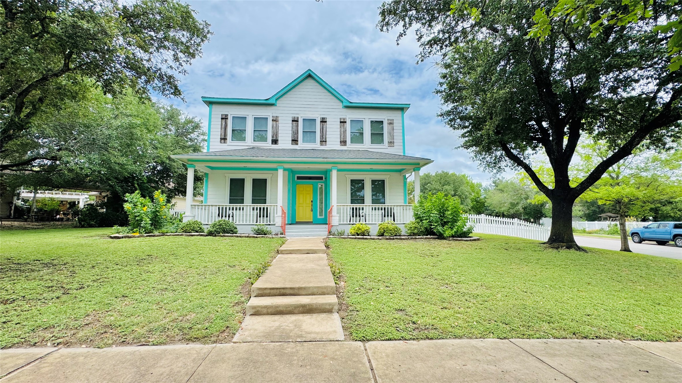 401 Witte Road Kyle, TX 78640 - Photo 1 of 24 A classic facade with a vibrant pop of color welcomes you to this charming residence.