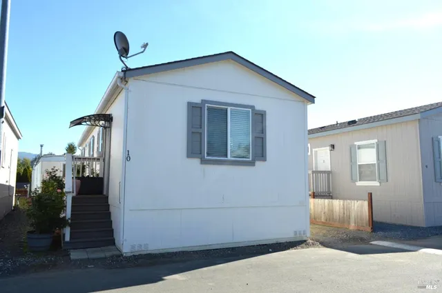 a house view with a wooden door