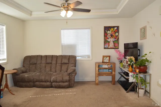 a kitchen with stainless steel appliances kitchen island granite countertop a refrigerator stove and sink