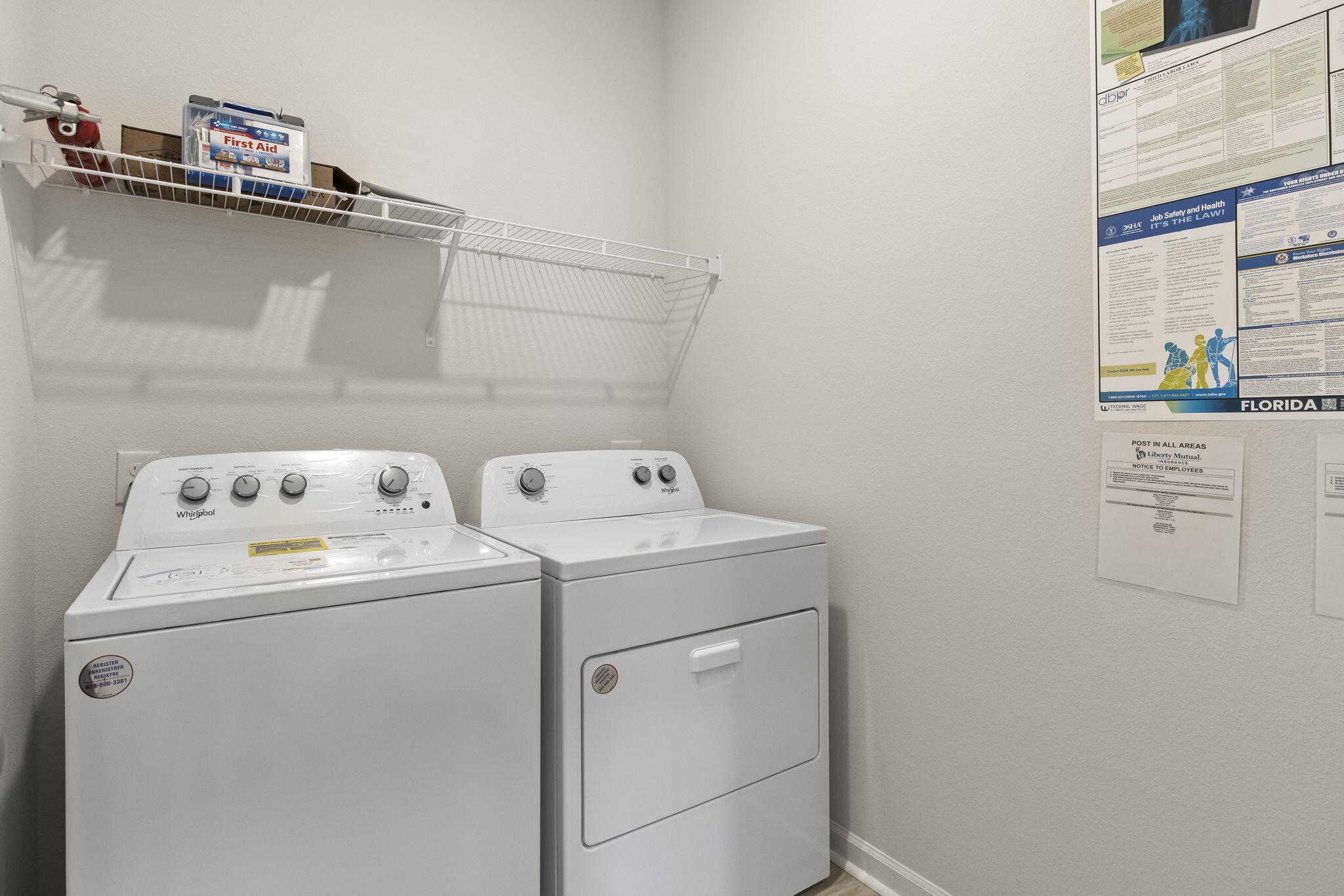 6533 Burleson Boulevard Crestview, FL 32539 - Photo 30 of 38 a utility room with dryer and washer