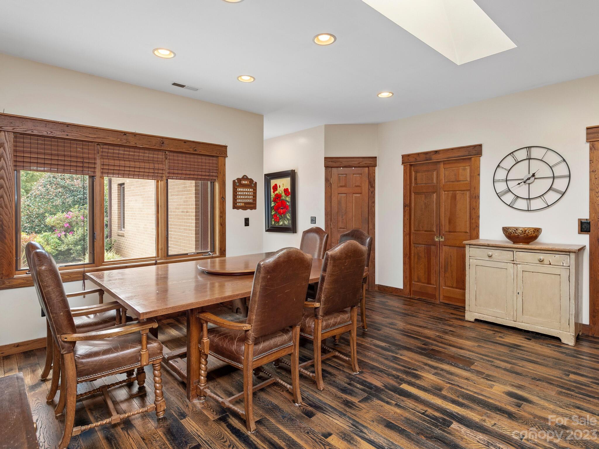574 Golden Road Columbus, NC 28722 - Photo 20 of 48 a view of a dining room with furniture window and wooden floor