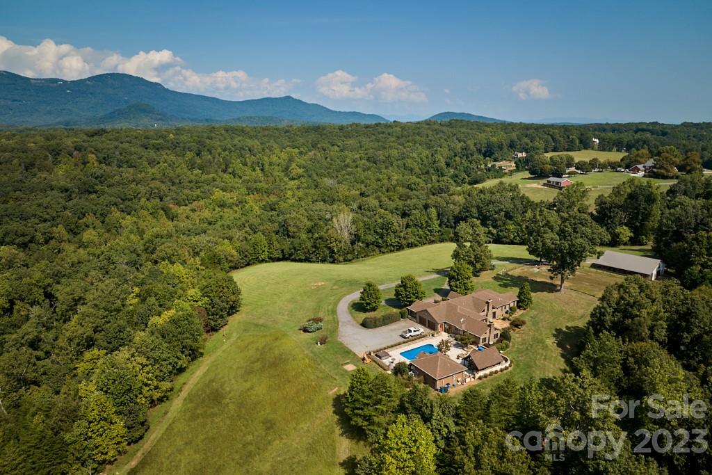 574 Golden Road Columbus, NC 28722 - Photo 3 of 48 an aerial view of residential house with outdoor space