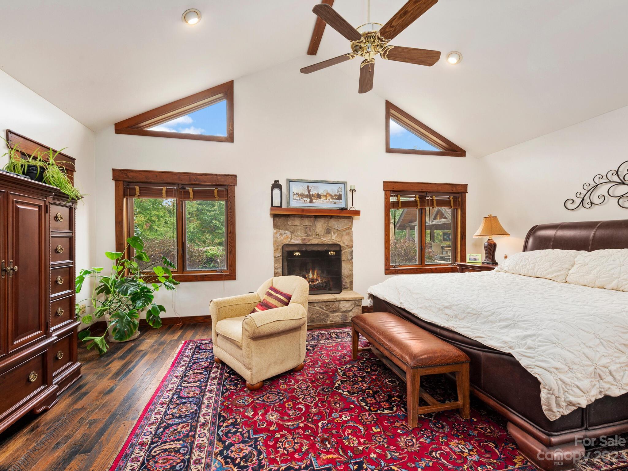 574 Golden Road Columbus, NC 28722 - Photo 31 of 48 a living room with furniture a window and a fireplace