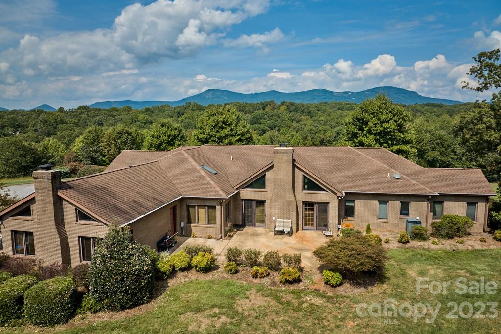 574 Golden Road Columbus, NC 28722 - Photo 5 of 48 front view of house with a yard