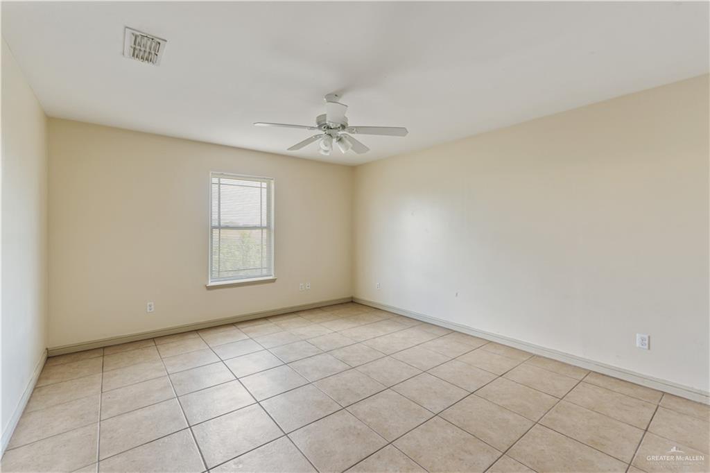 1500 Humming Bird Court, Unit 16 Pharr, TX 78577 - Photo 8 of 26 a view of an empty room with a window