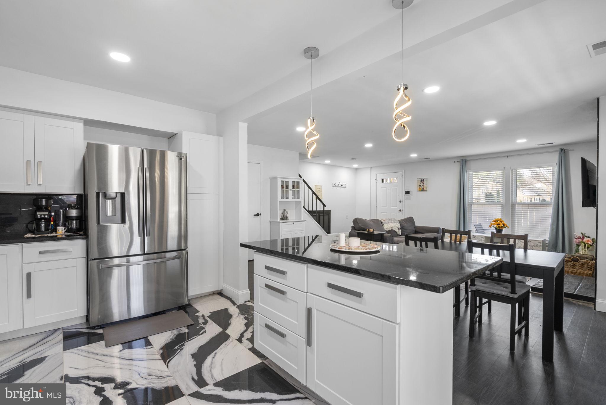 11317 Hawks Ridge Terrace, Unit 91 Germantown, MD 20876 - Photo 17 of 41 Modern kitchen with sleek finishes.