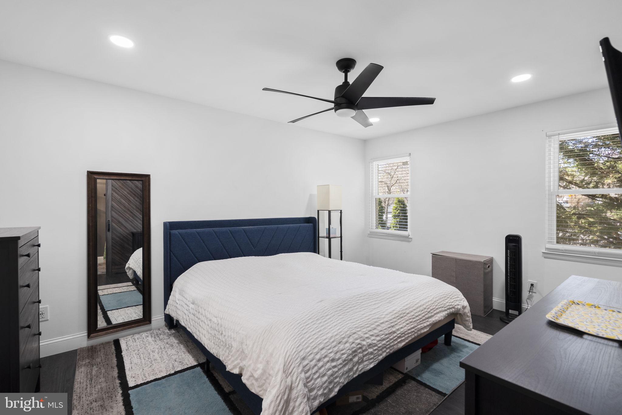 11317 Hawks Ridge Terrace, Unit 91 Germantown, MD 20876 - Photo 25 of 41 Modern serenity in a bright bedroom.