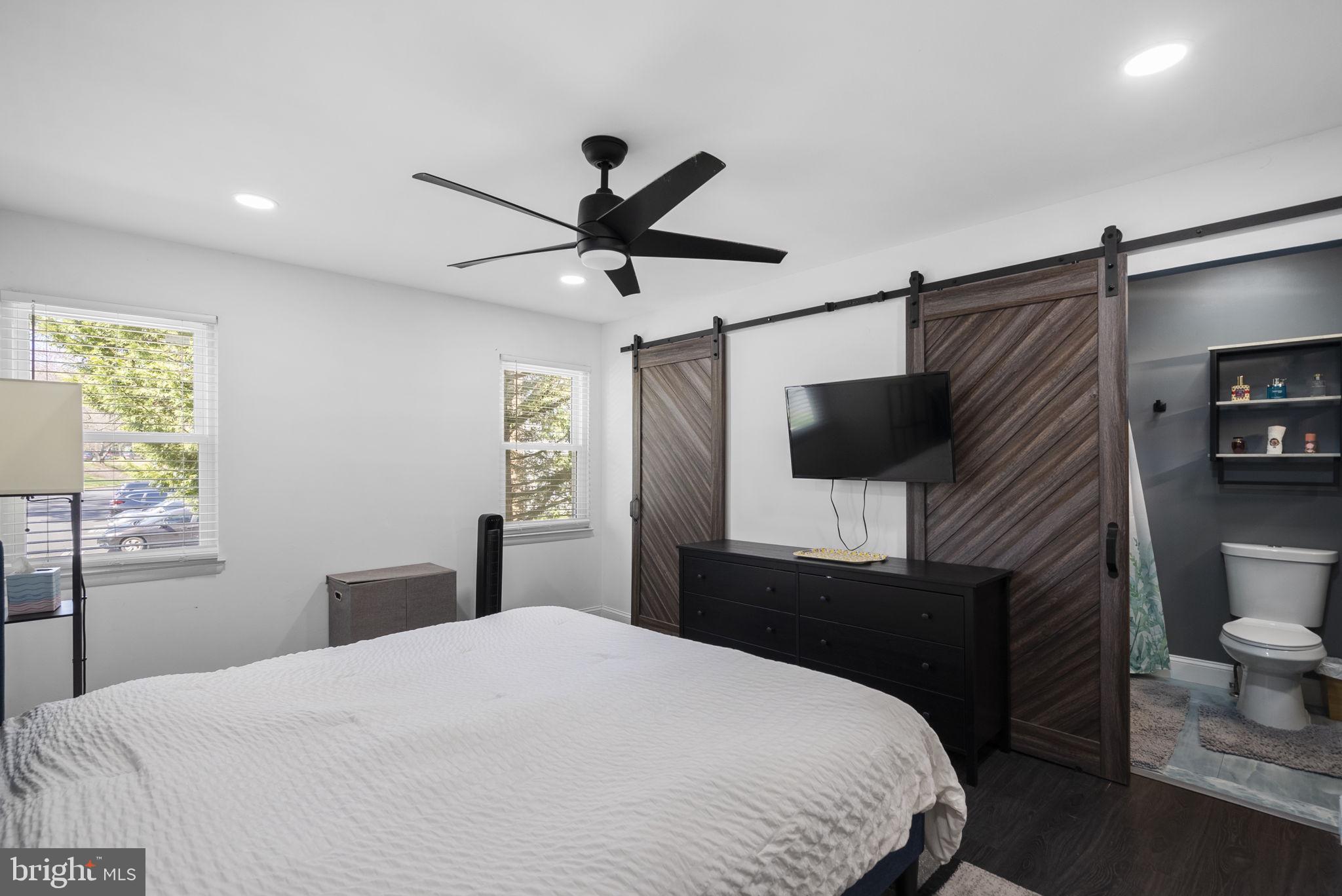 11317 Hawks Ridge Terrace, Unit 91 Germantown, MD 20876 - Photo 26 of 41 Modern bedroom with stylish accents.