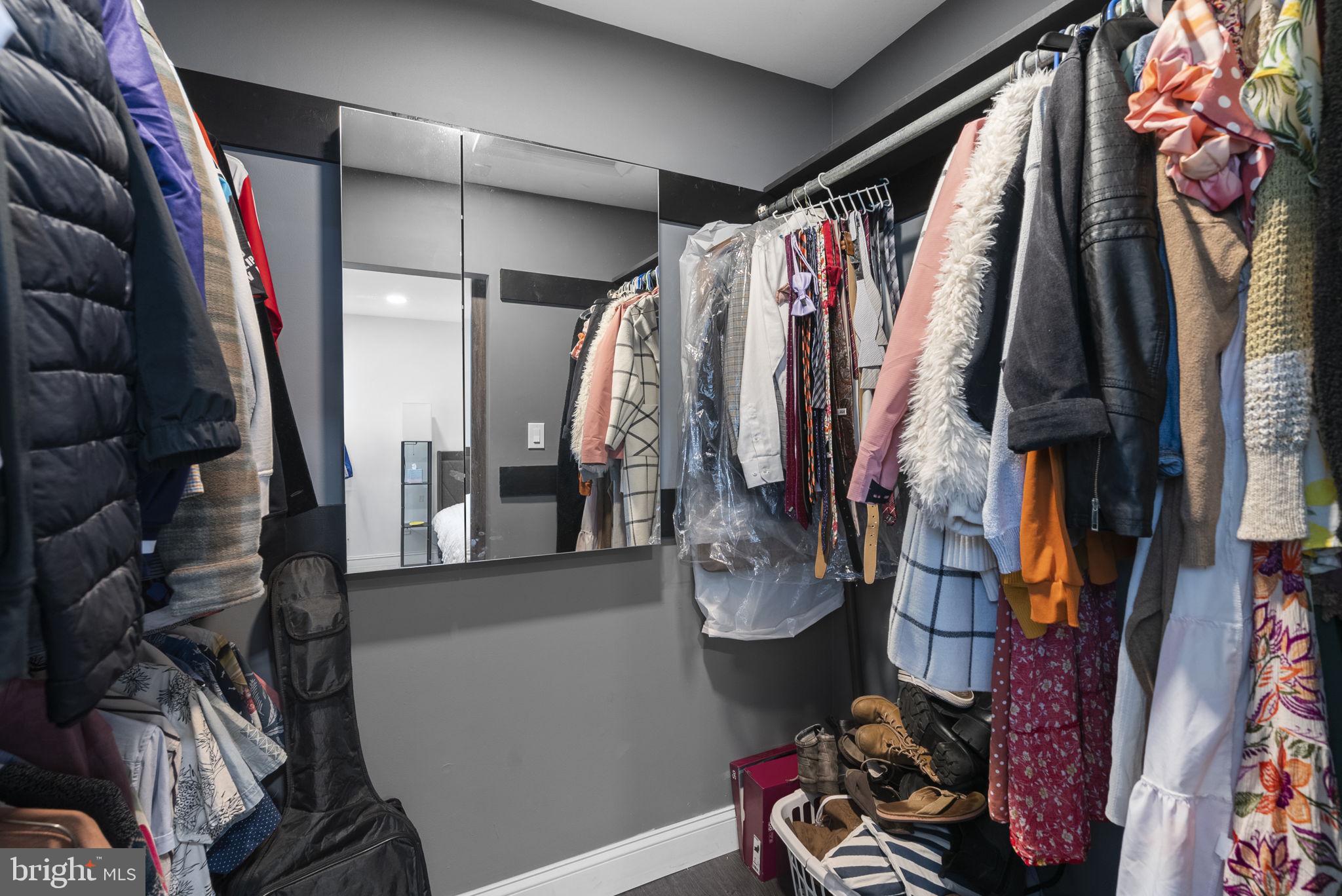 11317 Hawks Ridge Terrace, Unit 91 Germantown, MD 20876 - Photo 28 of 41 Stylish closet with organized attire.