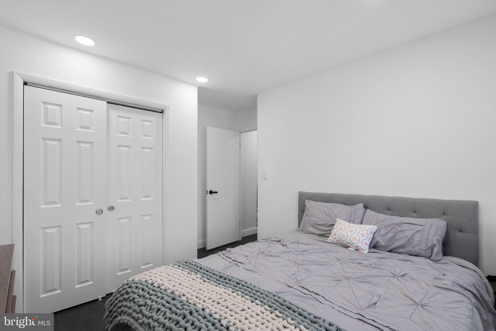 11317 Hawks Ridge Terrace, Unit 91 Germantown, MD 20876 - Photo 34 of 41 Serene bedroom with modern touches.