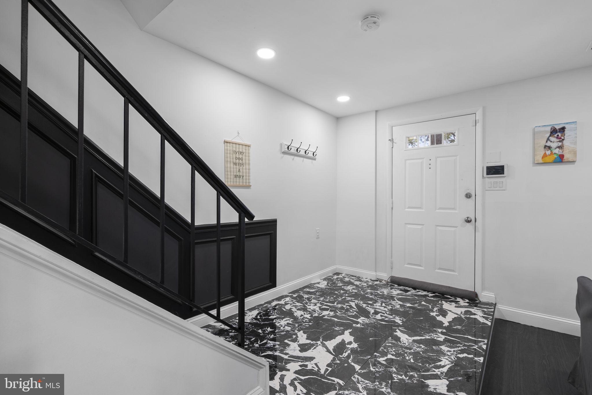 11317 Hawks Ridge Terrace, Unit 91 Germantown, MD 20876 - Photo 4 of 41 Modern entryway with stylish flair.