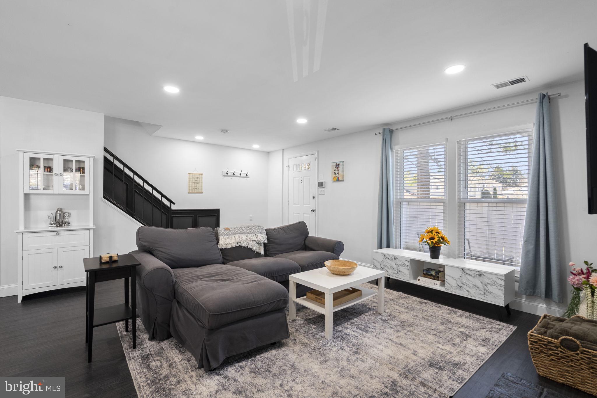 11317 Hawks Ridge Terrace, Unit 91 Germantown, MD 20876 - Photo 6 of 41 Modern living space with natural light.