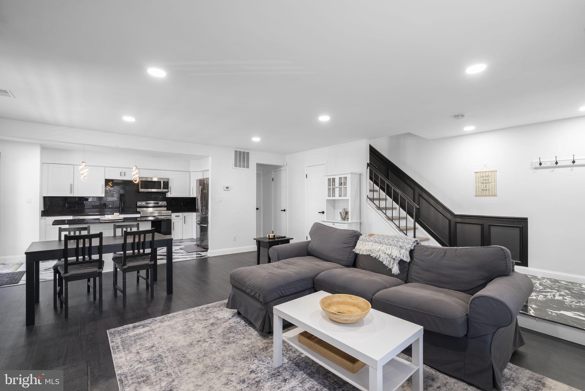 11317 Hawks Ridge Terrace, Unit 91 Germantown, MD 20876 - Photo 7 of 41 Modern elegance in open living space.