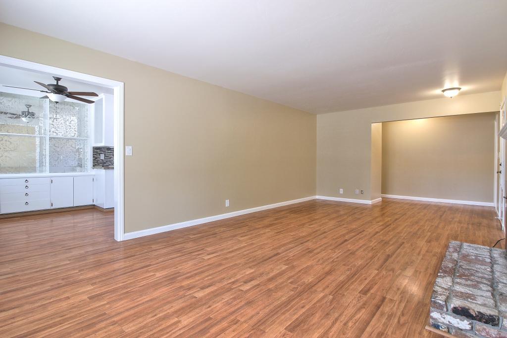 2760 Roop Road Gilroy, CA 95020 - Photo 4 of 16 wooden floor in an empty room with a window