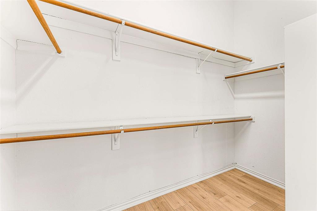 111 Midcrest Drive Irving, TX 75063 - Photo 15 of 26 a view of small space with racks on the wall