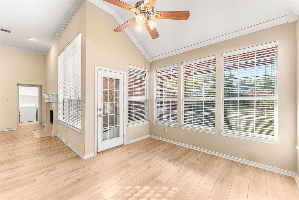 111 Midcrest Drive Irving, TX 75063 - Photo 10 of 26 a view of an empty room with a window