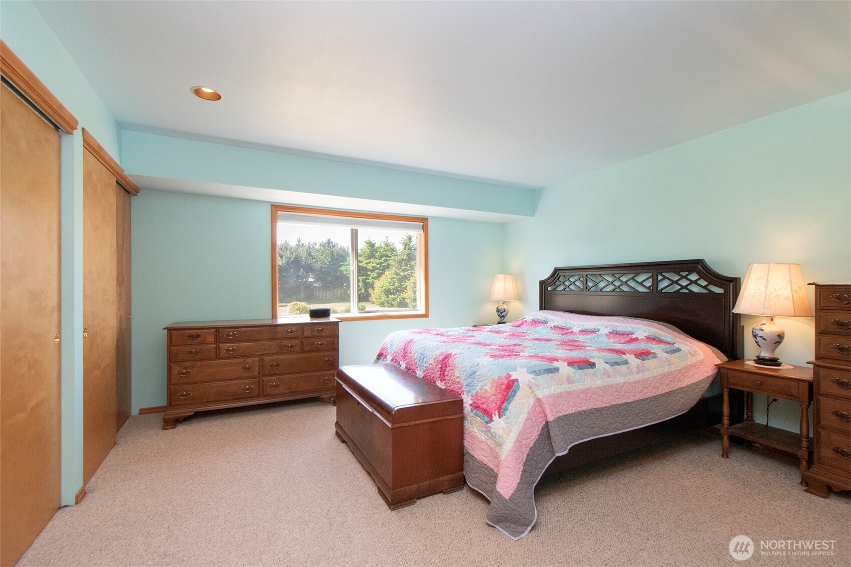 101 Timothy Lane Sequim, WA 98382 - Photo 23 of 39 a bedroom with a bed and a window