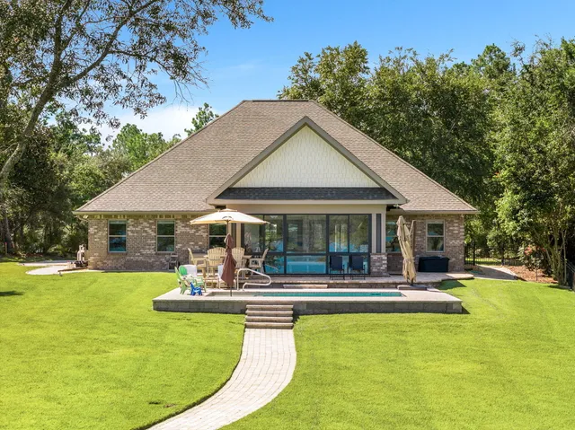 a front view of a house with a porch
