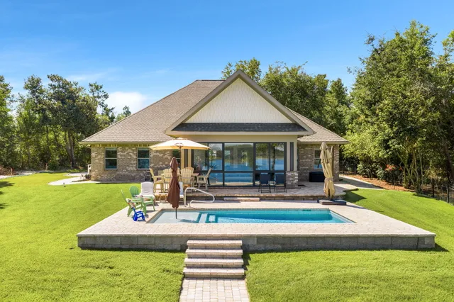 a view of a swimming pool and outdoor space