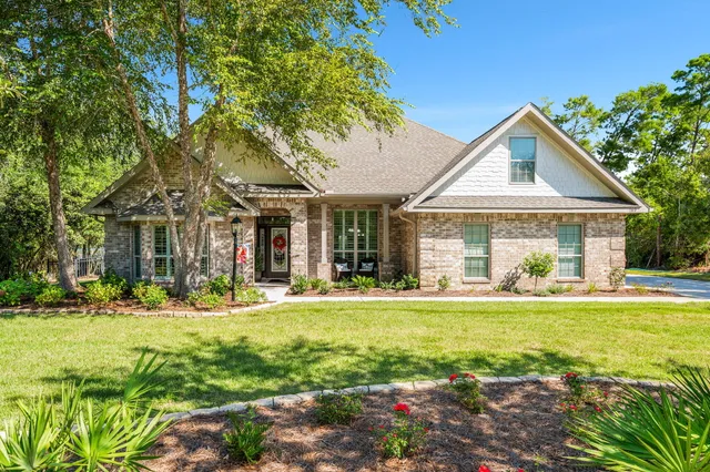 a view of a lake with a big yard